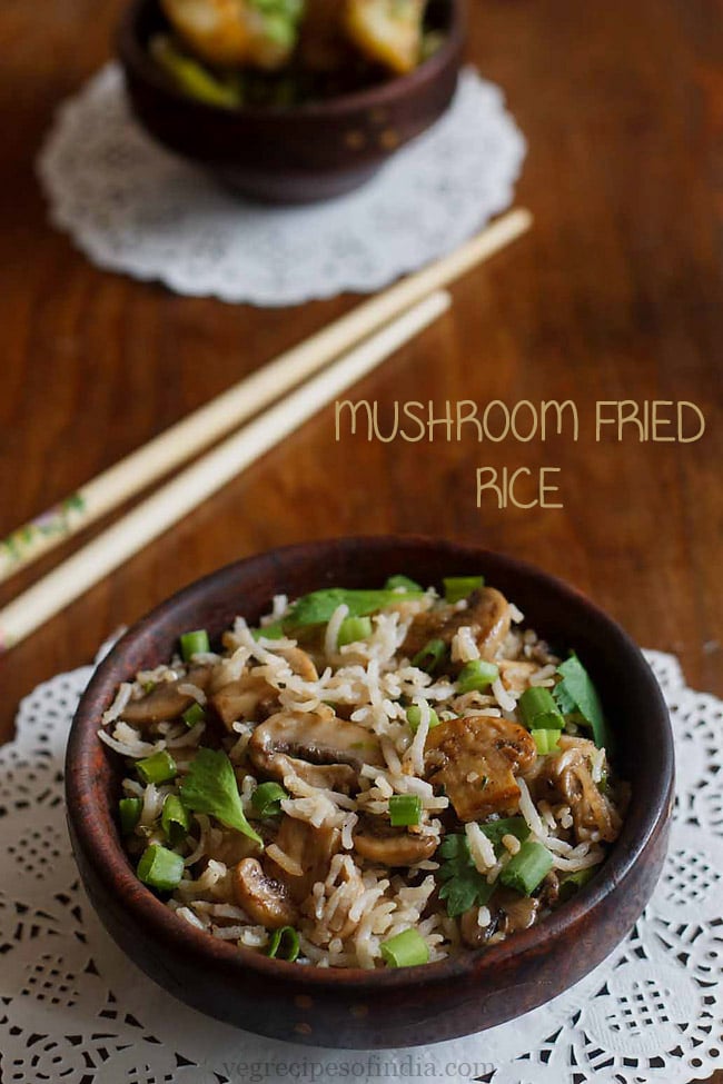 mushroom fried rice served in a black bowl