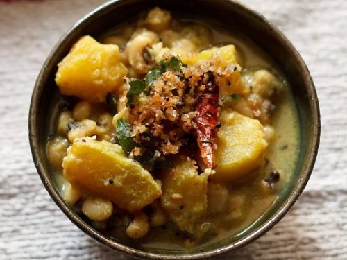 mathanga erissery served in a ceramic bowl.