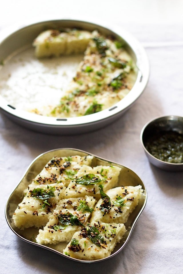 rava dhokla served in a steel plate