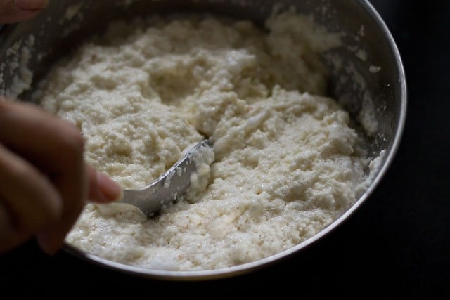 mix all ingredients again with a spoon to make suji dhokla batter