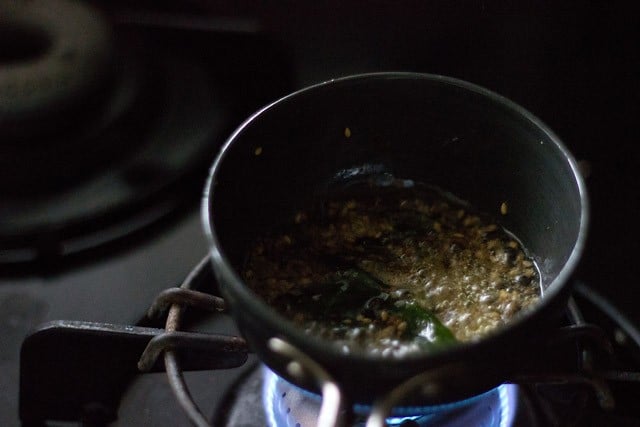 cumin asafoetida sesame seeds and curry leaves added