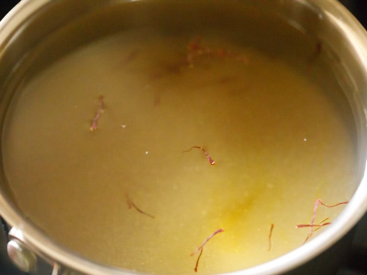 heating sugar solution for kesari recipe.