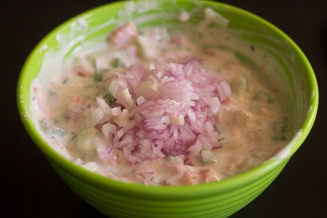 chopped onions added to veg raita. 