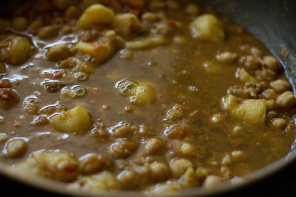 cooking aloo chana sabji