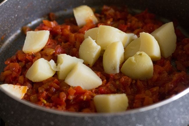 chopped boiled potatoes added to the pan. 