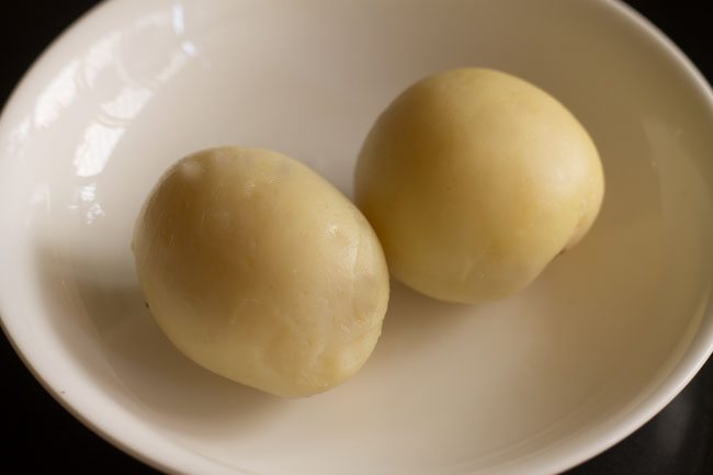 boiled and peeled potatoes. 