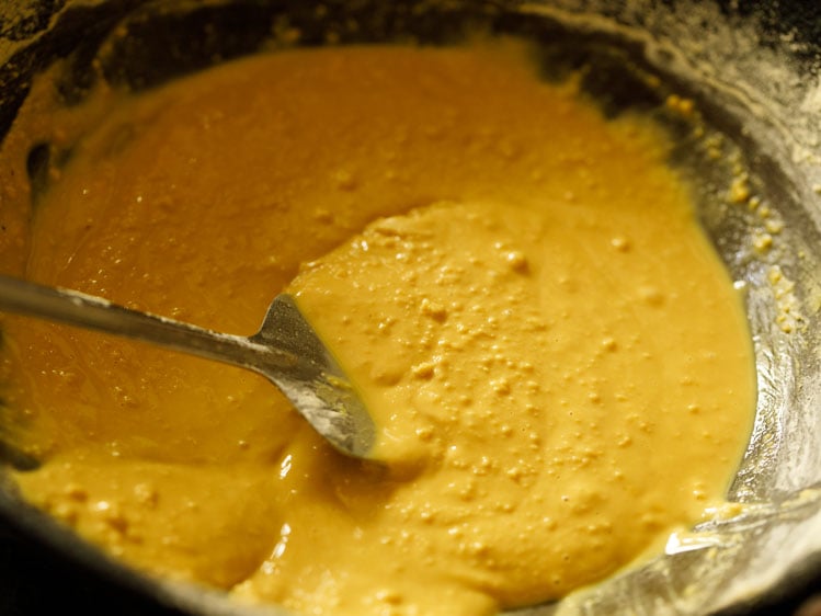 stirring this ghee and besan mixture often while roasting