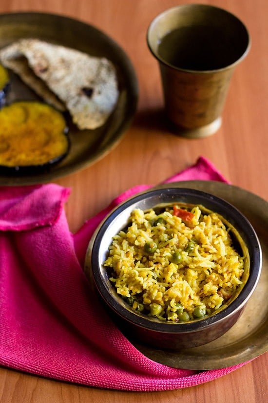 Bengali khichdi served with baingan bhaja and papad