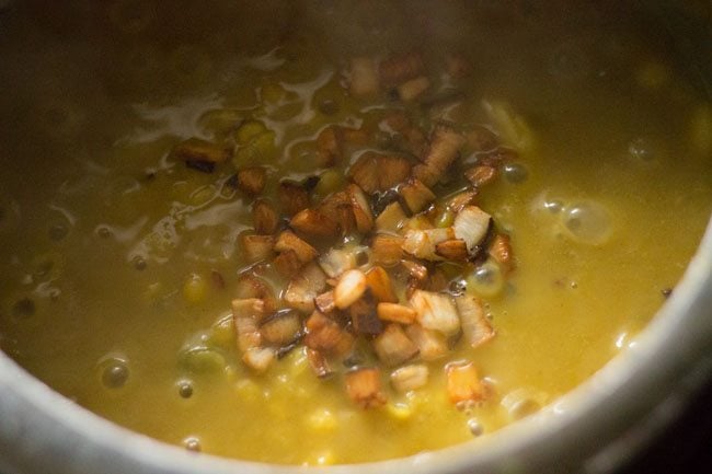 light golden fried coconut added to cholar dal