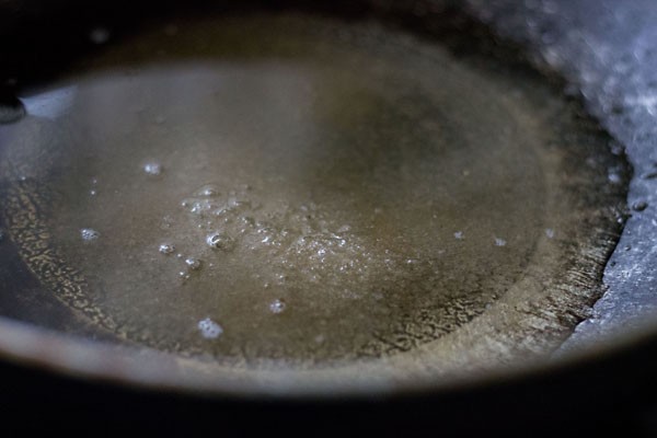 preparing kaju katli - sugar water solution