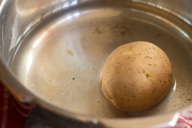 boiling potato in a pressure cooker