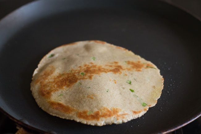 flip and cooking kuttu ka paratha other side