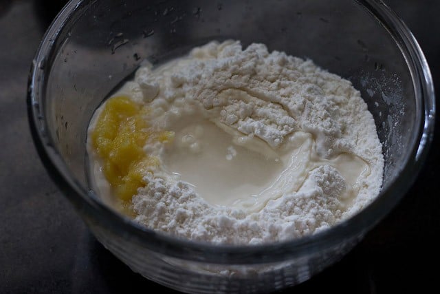 all purpose flour, salt, ghee and water added in a mixing bowl for making dough. 