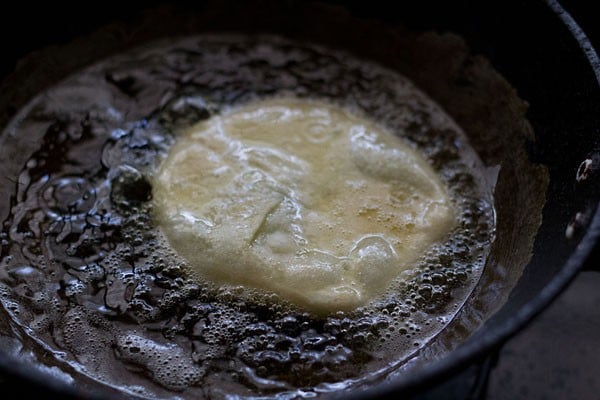 frying koraishutir kochuri in hot oil. 