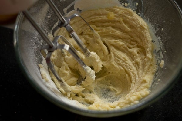 top shot of cookie dough mixture in mixing bowl.