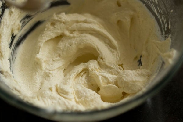 top shot of cookie dough mixture in mixing bowl.