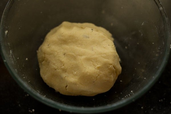 top shot of Nankhatai dough in glass bowl.