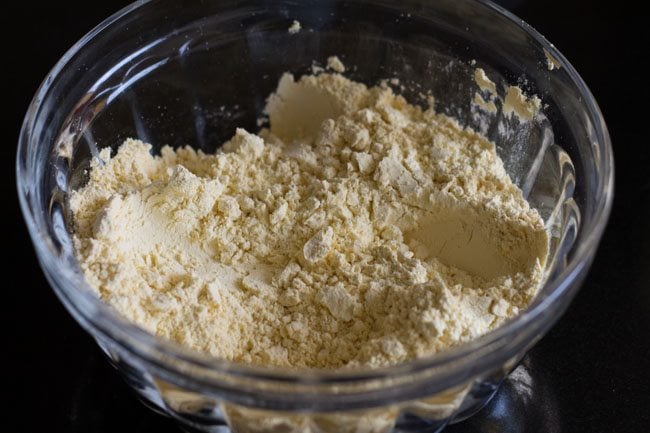 gram flour in a glass mixing bowl