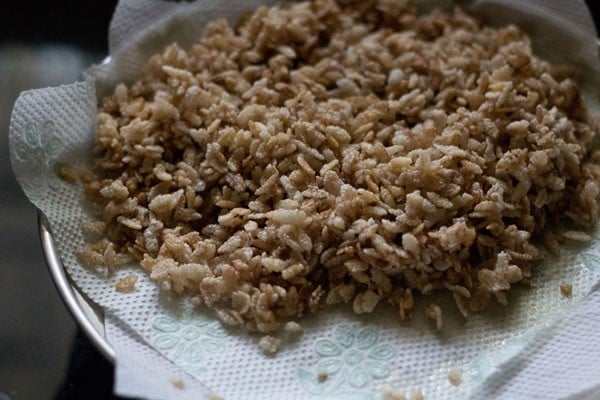 fried red poha on paper towels