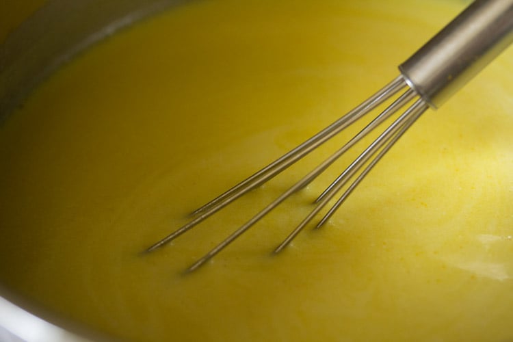 stirring rajasthani kadhi. 