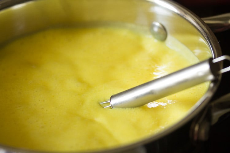 simmering boiling kadhi. 