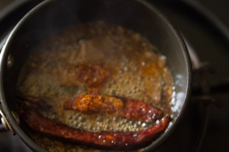 red chili powder added to the pan. 