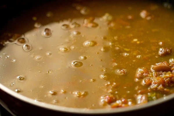 stock and water added to bean and curry mixture