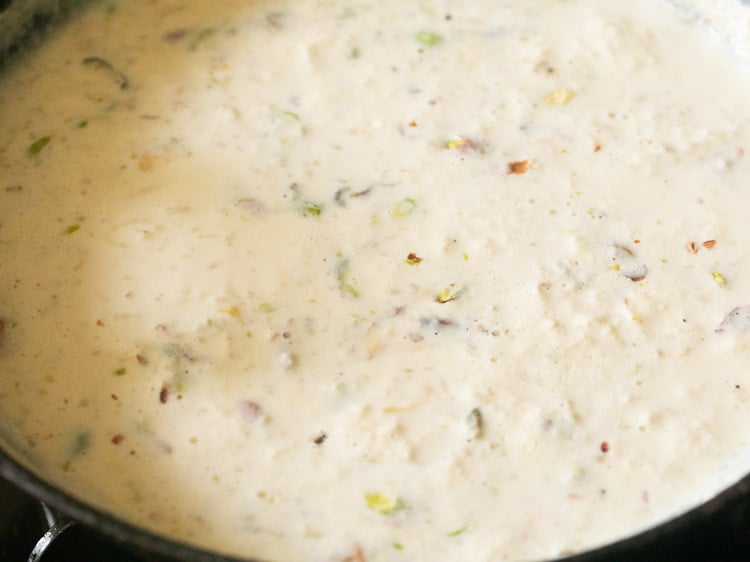 mixing nuts in the kheer