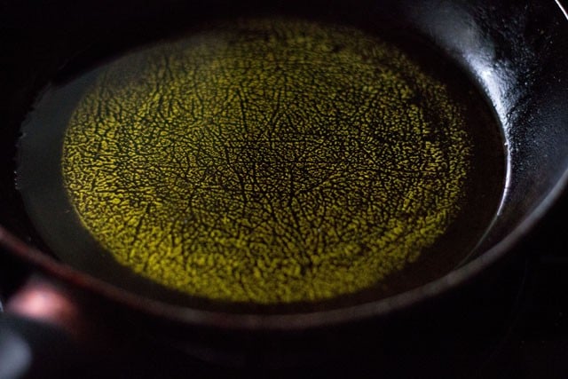 melting ghee in a pan. 