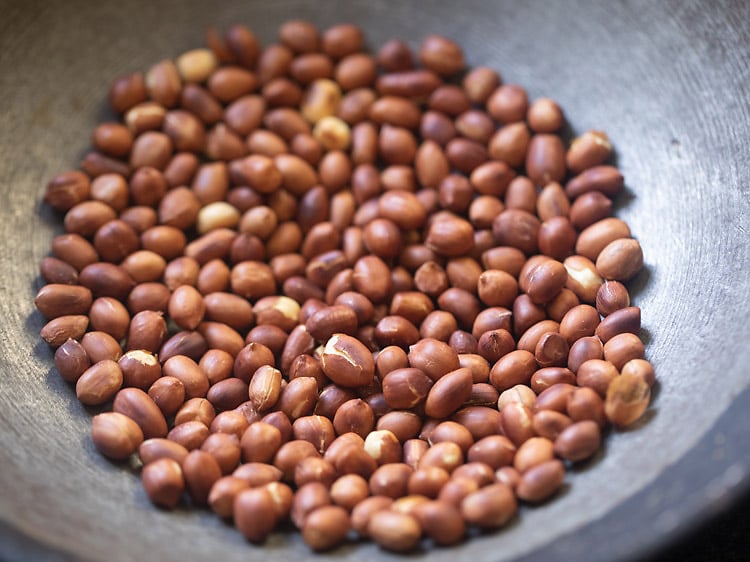 roasted peanuts in the frying pan for sabudana khichdi recipe.