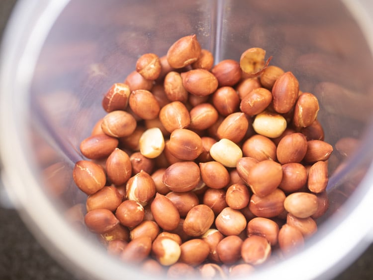 roasted peanuts added to a grinder jar for sabudana khichdi recipe. 