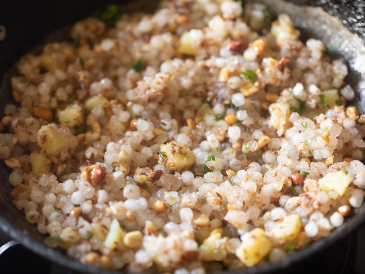 coriander leaves mixed well in the khichdi. 