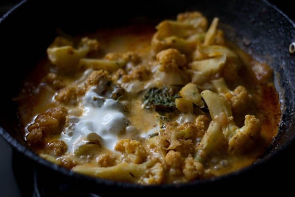 crushed dried fenugreek leaves, low fat cream and nutmeg powder added to cooked gobi masala. 