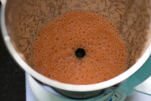 smooth tomato-cashew paste in a blender jar for making cauliflower masala. 