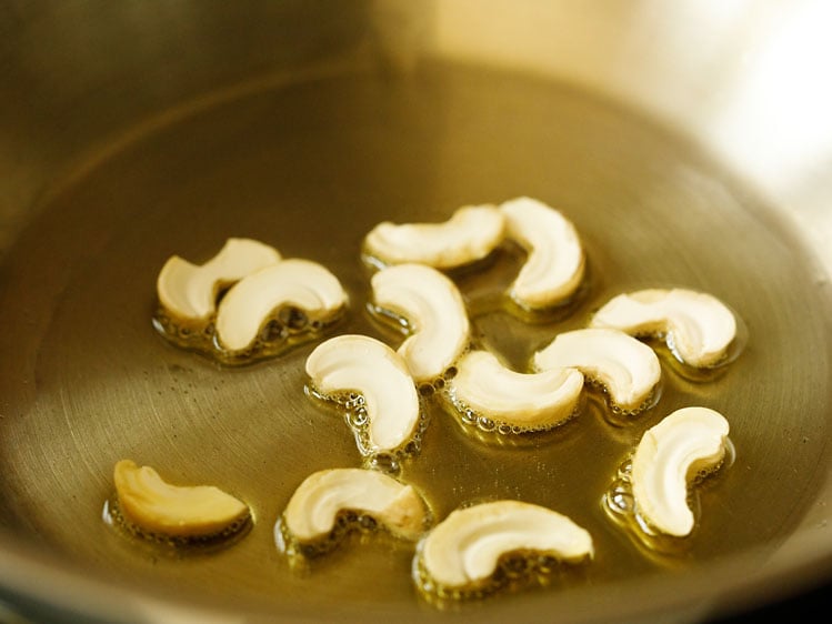 cashews in ghee in pan
