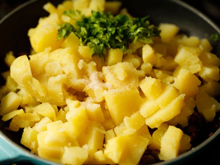 potatoes, salt and coriander leaves added