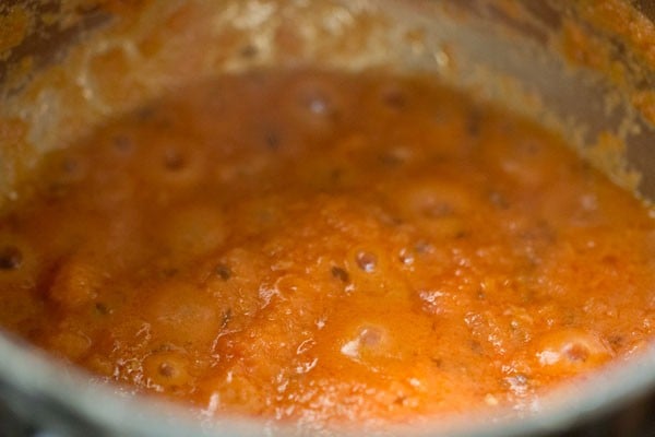 masala bubbling in a pot