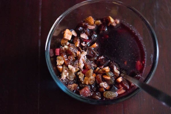 chopped nuts and dry fruits soaking in red wine. 