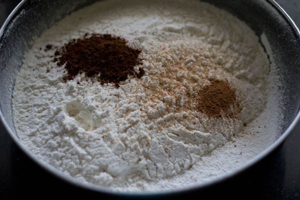 spice powders and instant coffee added to mixture of all purpose flour, salt, baking soda and baking powder. 
