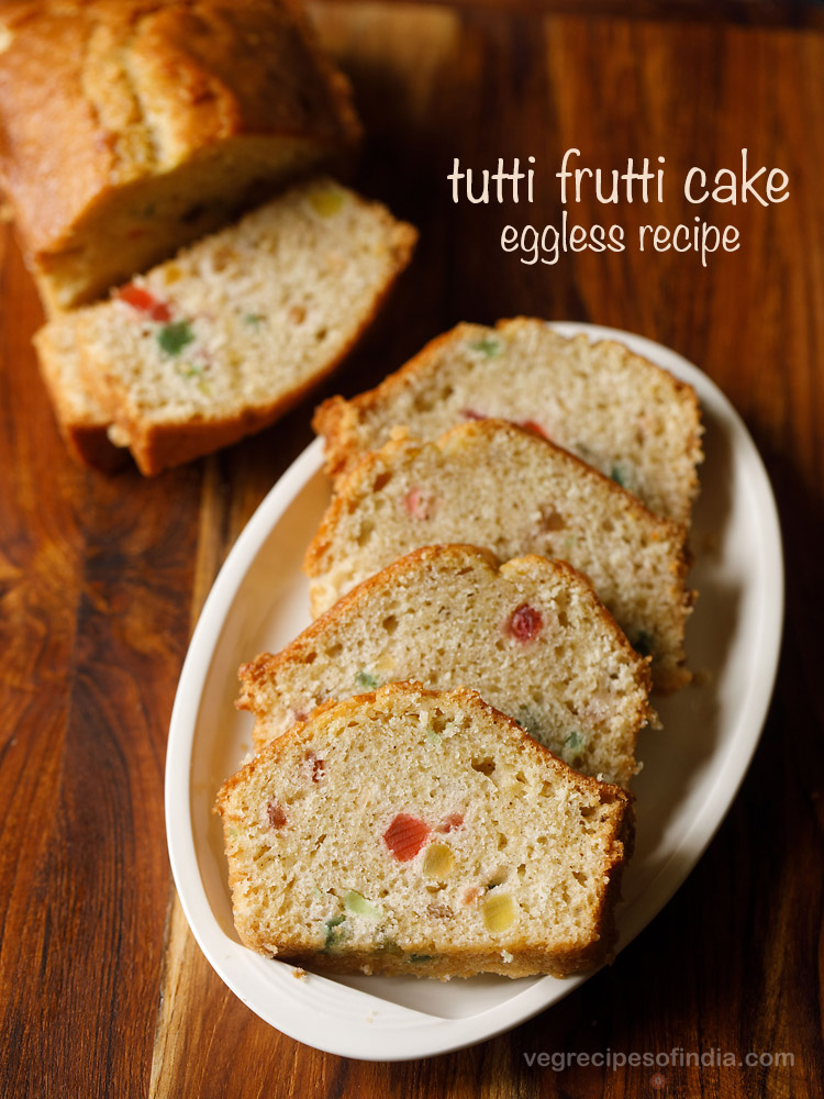 eggless tutti frutti cake placed on a white plate