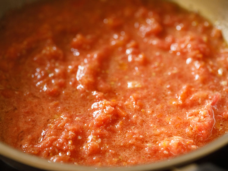 crushed tomatoes being cooked