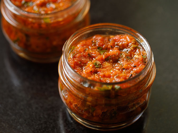 pizza sauce placed in a small glas jar