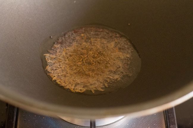 Cumin seeds sputtered in hot oil. 