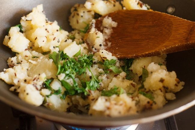 sautéing potato mixture. 