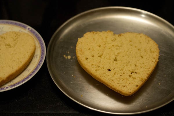 heart shaped vanilla cake sliced in half