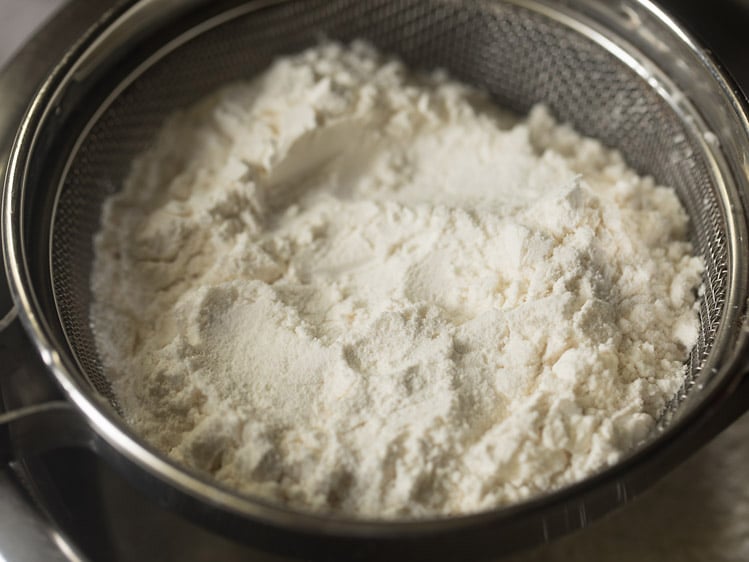 all purpose flour in a sieve