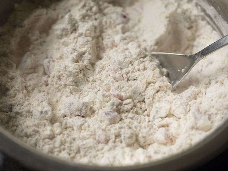 mixing  tutti frutti with flour