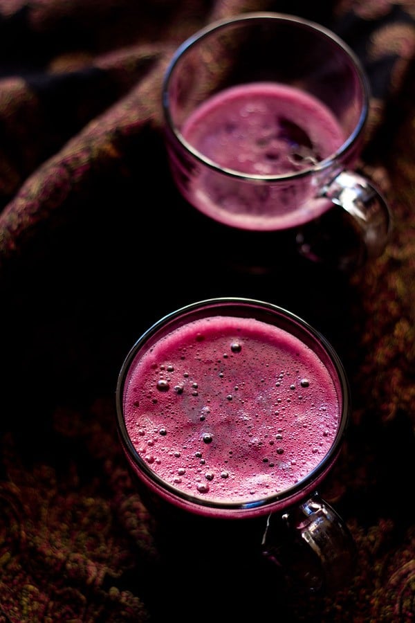 black grape juice served in glasses. 