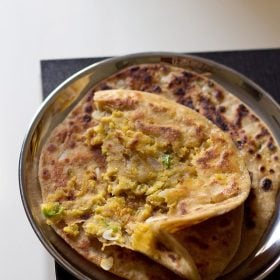 dal paratha served on a plate.