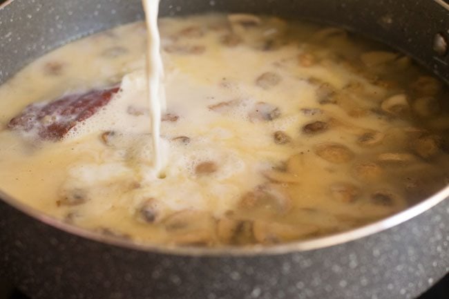 adding milk to the pot